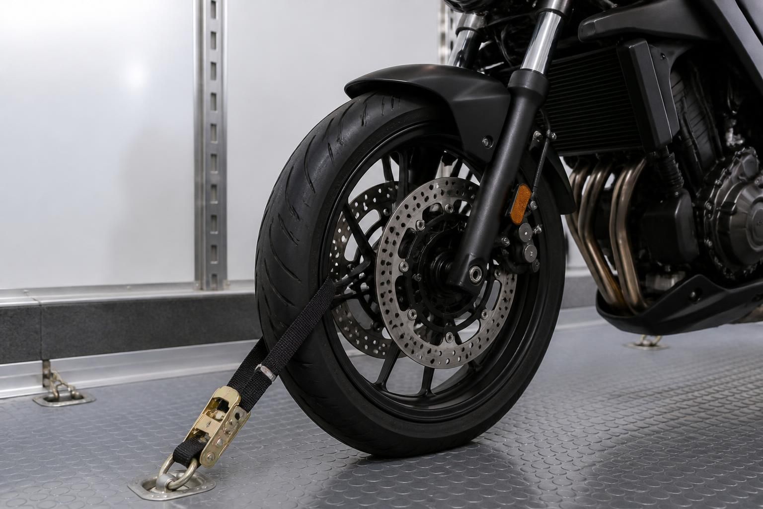 Non-running motorcycle in a clean storage setting